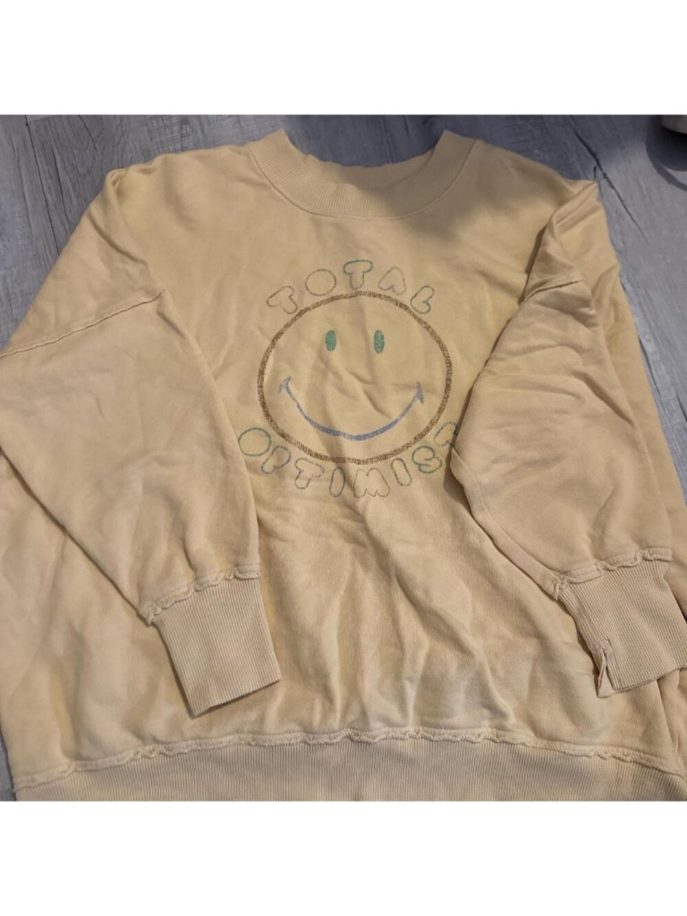 Cream crewneck sweatshirt with smiley face design #loungewear #cozy